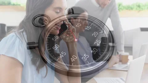 Business team working on laptops while stopwatch overlay ticking, woman calling, Stock Footage 318240551