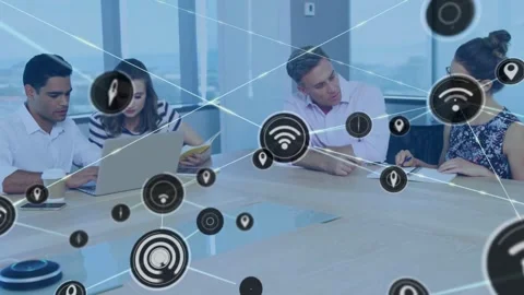 Business team working at table pulsing icon creating network mesh covering table Stock Footage 334039295