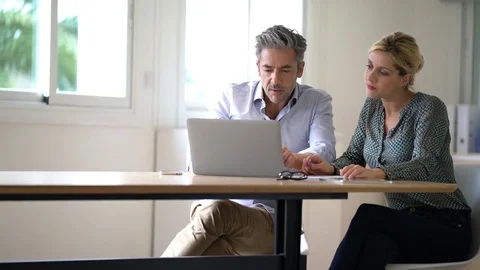 Business team working together on project in office Stock Footage 72612151