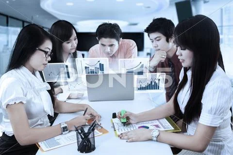 Business team working with virtual chart Stock Photos
