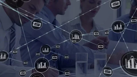 Business team writing at table central node appearing branching web showing Stock Footage 332686345