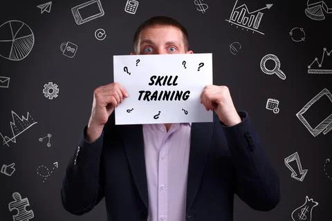 Business, technology, internet and network concept. Young businessman thinks  Stock Photos