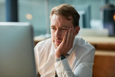Business, thinking and man on computer for decision, solution or problem solving Stock Photos