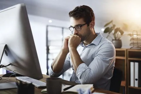 Business, thinking and man with computer, ideas and online reading with internet Stock Photos