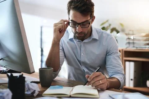 Business, thinking and man with computer, notes and reading with internet Stock Photos