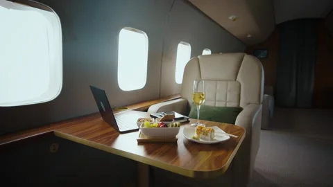 Business travel experience inside private jet cabin with luxury workspace a.. Stock Footage 337600885