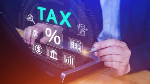 Business using computer to complete Individual income tax return form onlin.. Stock Photos