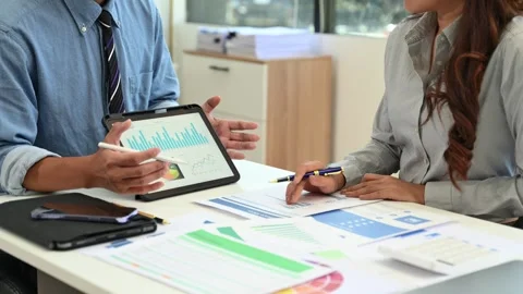 Business using a tablet and stylus for project planning. Perfect for digita.. Stock Footage 313461417