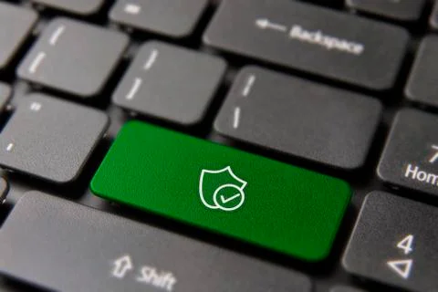 Business web security shield on computer keyboard Stock Photos