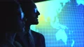 The business woman and a man discussing near the screen 4k or 4k+ Resolution