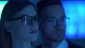 The business woman and a man smiling on the blue background 4k or 4k+ Resolution