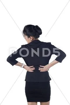 Business woman with back pain isolated white background Stock Photos