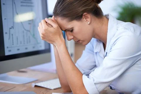 Business woman, computer and stress for bankruptcy risk, stock market crash or Stock Photos