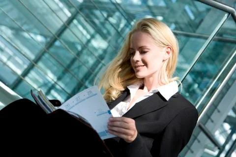 Business woman with diary, portrait Stock Photos