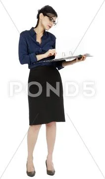 Business woman flipping document page Stock Photos