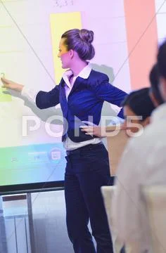 Business woman giving presentation Stock Photos