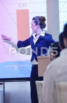 Business woman giving presentation Stock Photos