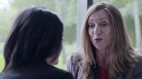 Business woman interacting with executive in office Stock Footage 59382090