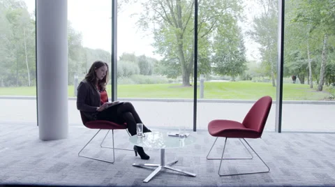 Business woman interacting with executive in office Stock Footage 59382167