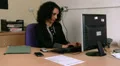 Business woman takes an exciting phone call HD Footage