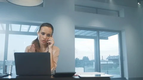 Business woman talking phone. Upset female person explaining on mobile phone. Stock Footage