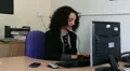Business woman talks defiantly on the phone HD Footage