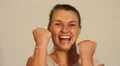Business woman triumphant double fist pump HD Footage