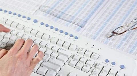 Business woman typing on a computer keyboard Stock Footage