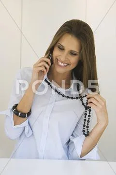Business woman using mobile phone, portrait Stock Photos