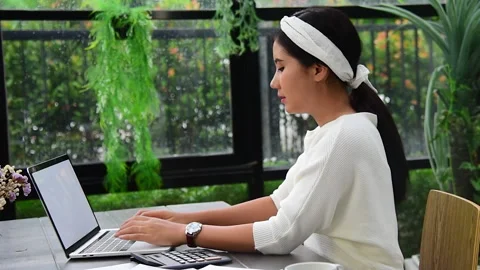 Business woman using smartphone, laptop on office desk Stock-Footage 268778053