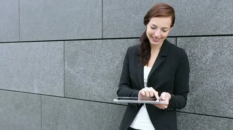 Business woman using tablet computer Video stock 12227941