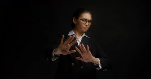 Business woman waves her hands away, shows a no gesture Stock Footage 172231853
