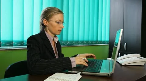 Business woman working at her desk, agent, manager,corporate, office Stock Footage