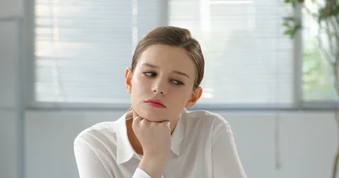 Business woman's anxious worry expression and behavior Stock Footage 100953058