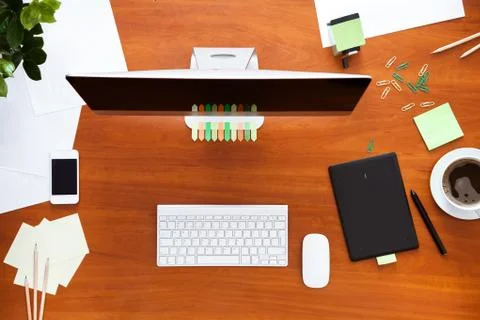 Business work desk with computer and supplies modern office background Foto stock