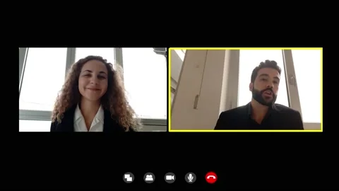 Business, work-two young colleagues on video call talk about the meeting Stock Footage 140682222