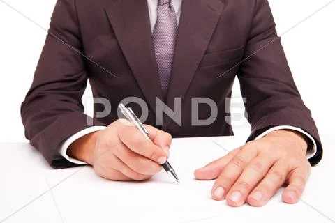 Business worker signing the contract on white Stock Photos