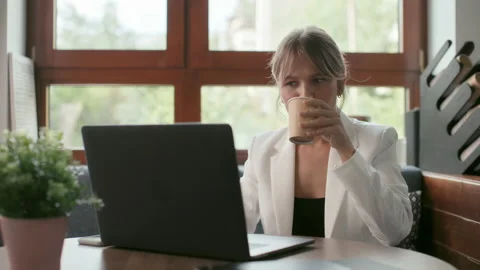 Business worker sits at table of office workplace. Remote work and online commun Stock Footage 199485212