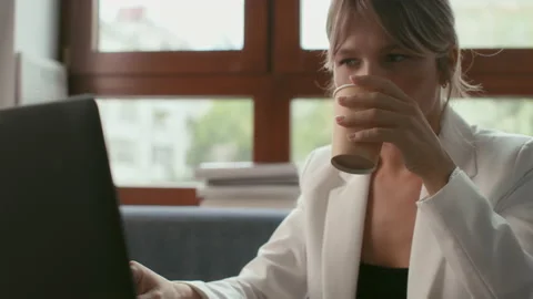 Business worker sits at table of office workplace. Remote work and online commun Stock Footage 199485312