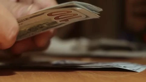 Business worker's hands counting dollar banknotes at the office. Concept of.. Stock Footage 266475212