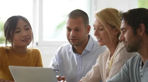 Business workgroup interacting in office Stock Footage 68200857
