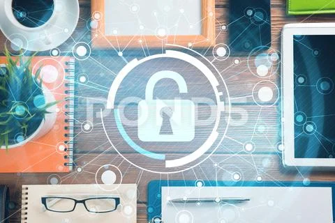 Business workplace with tablet pc and security concept on screen Stock Photos