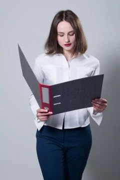 Business young woman with a folder Stock Photos
