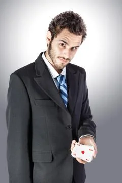 Businessman with an ace Stock Photos