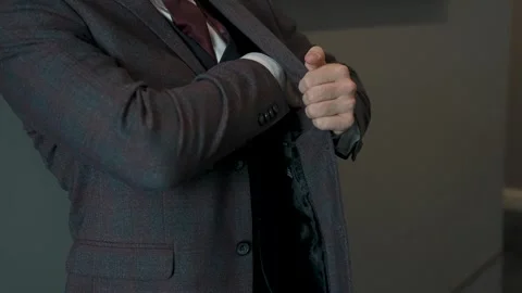 A businessman adjusts his jacket Stock Footage 329248166