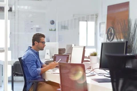 Businessman, agent or IT engineer with computer in office for online assist.. 库存照片