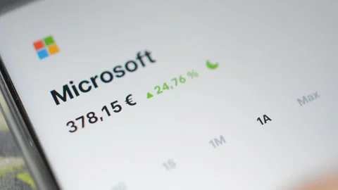 Businessman analysis Microsoft trading chart stock on trade republic app. Video stock 286977853