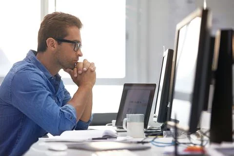 Businessman, analyst and thinking with computer in office for financial ana.. Stock-Fotos