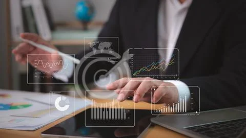 Businessman analytics with key performance indicators, Analyzing company ne.. Stock Photos