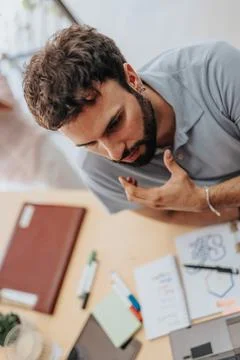 Businessman Analyzing and Explaining Project Instructions in Corporate Office Stock Photos